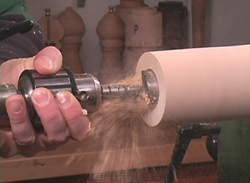 Drilling out the cavity for a peppermill on the lathe
