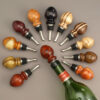 Wine / Bottle Stopper Tree and assortment of Ted Sokolowski Bottle Stoppers